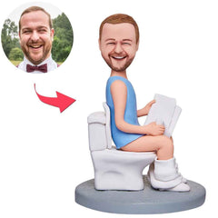 Man Sitting On The Toilet And Reading A Book Custom Bobbleheads With Engraved Text