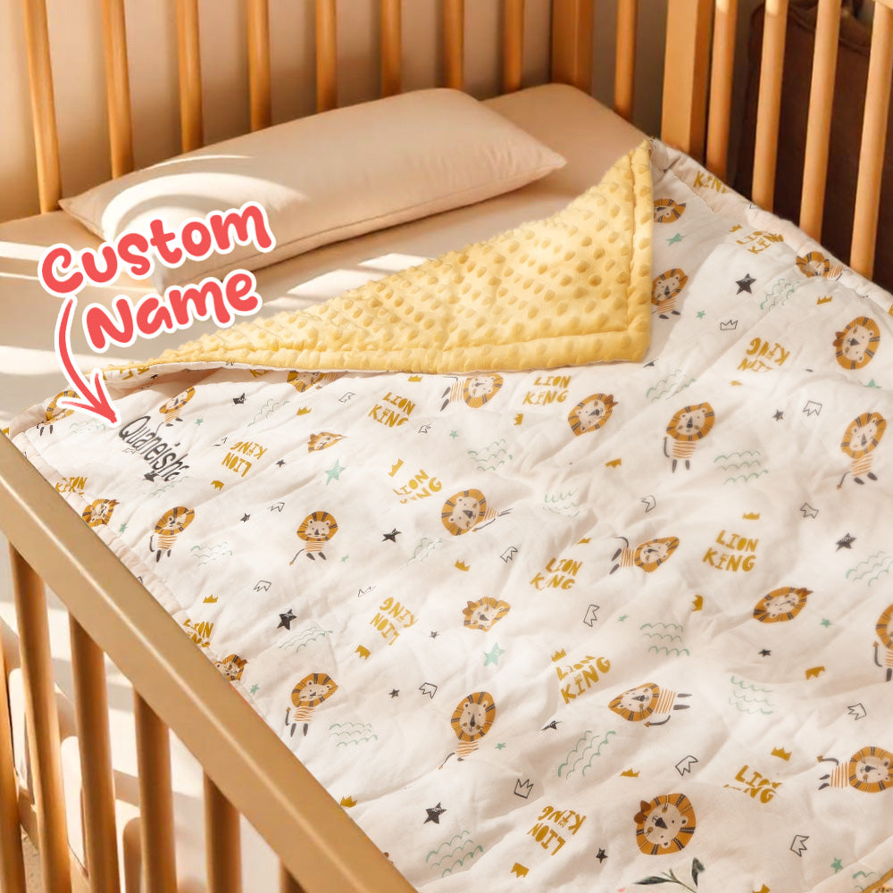 Full view of the personalised cotton baby blanket with embroidered name.