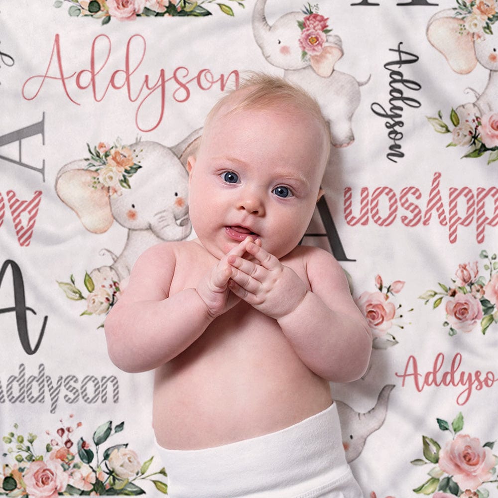 Flat lay of personalised elephant blanket showing name and floral artwork