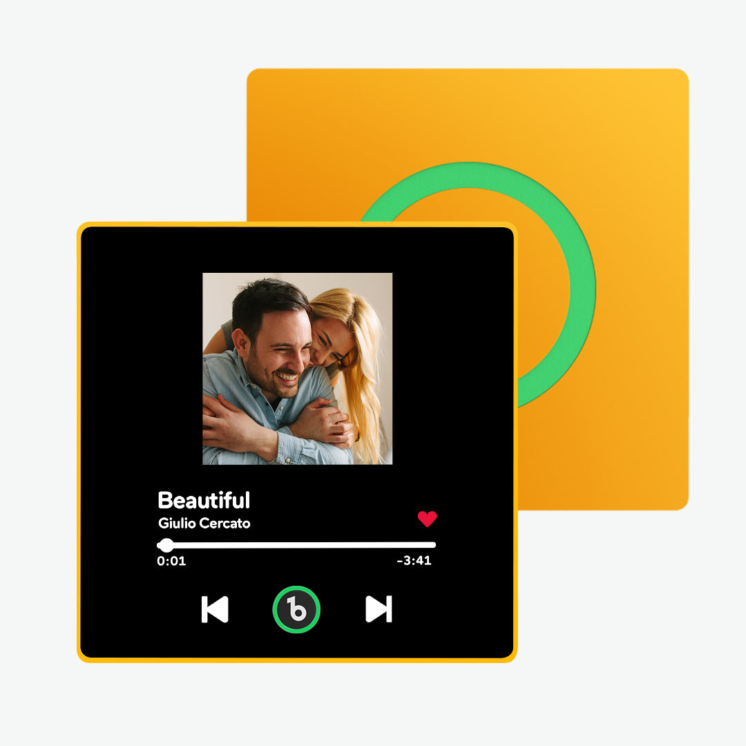 Close-up of FridgeBeats framed album showing USB charging port and waterproof acrylic – 30 minute charge for 4–6 hours playtime