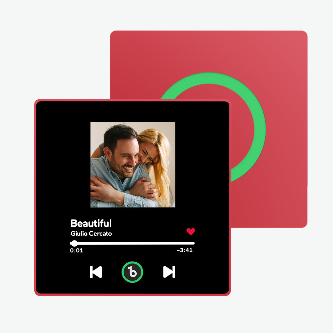 Two FridgeBeats personalised magnets on a fridge playing different songs – bespoke music gifts for him and her