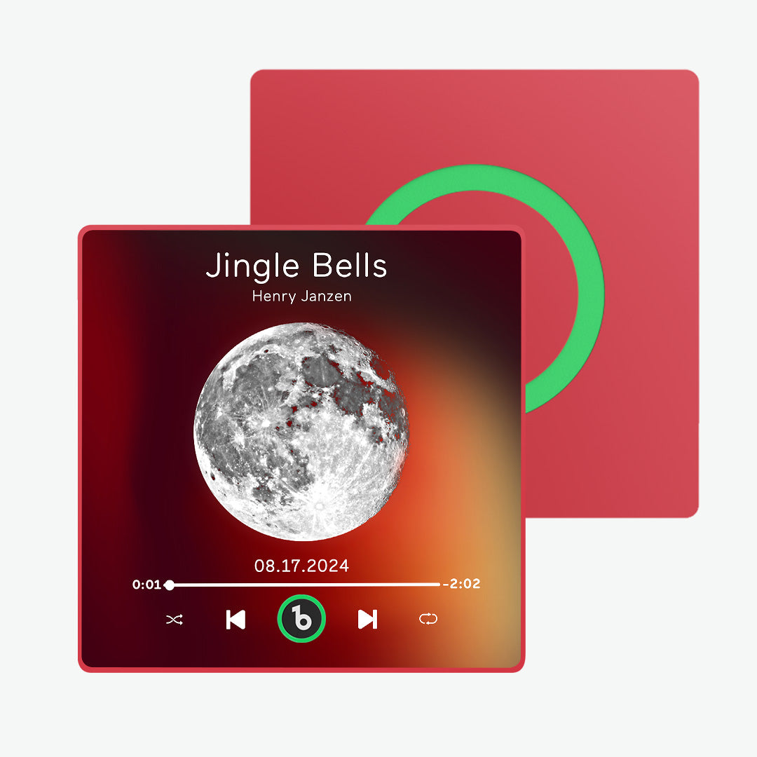 Couple placing a FridgeBeats 4.0 personalised music magnet on their fridge — romantic Valentine's Day gift and framed custom music magnet for couples