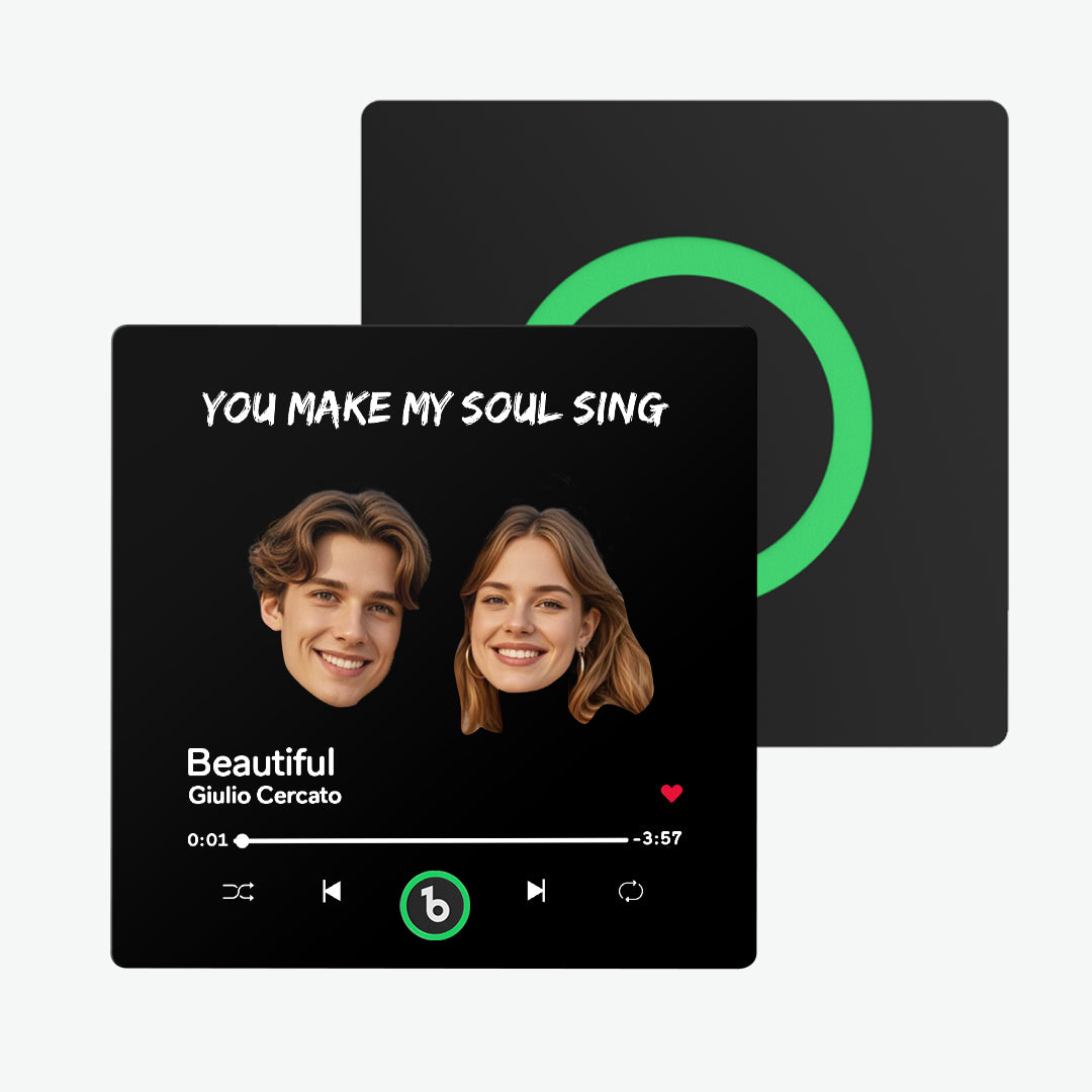 Detail view of play button and charging port on the rechargeable singing fridge magnet — supports MP3 playback for 4–6 hours