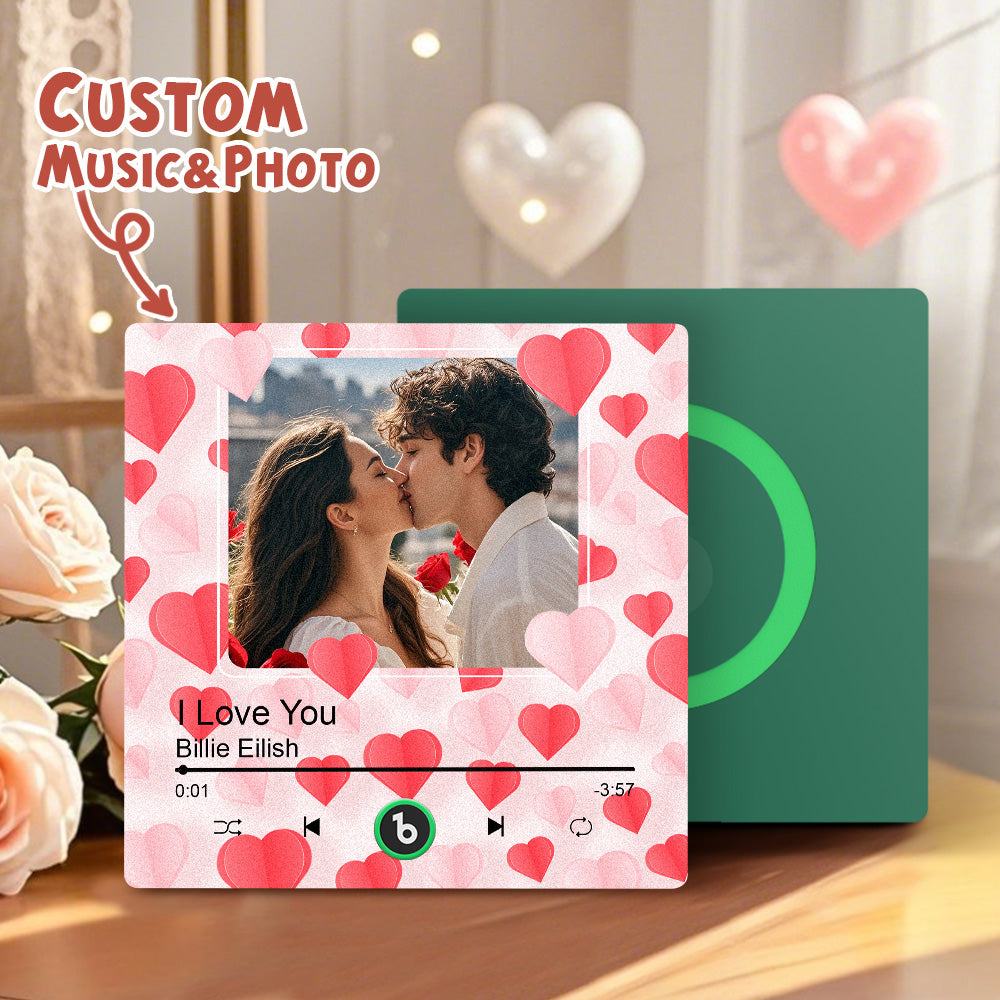 Hand pressing play on a frameless custom photo magnet to play a romantic song – unique personalised music fridge magnet for couples