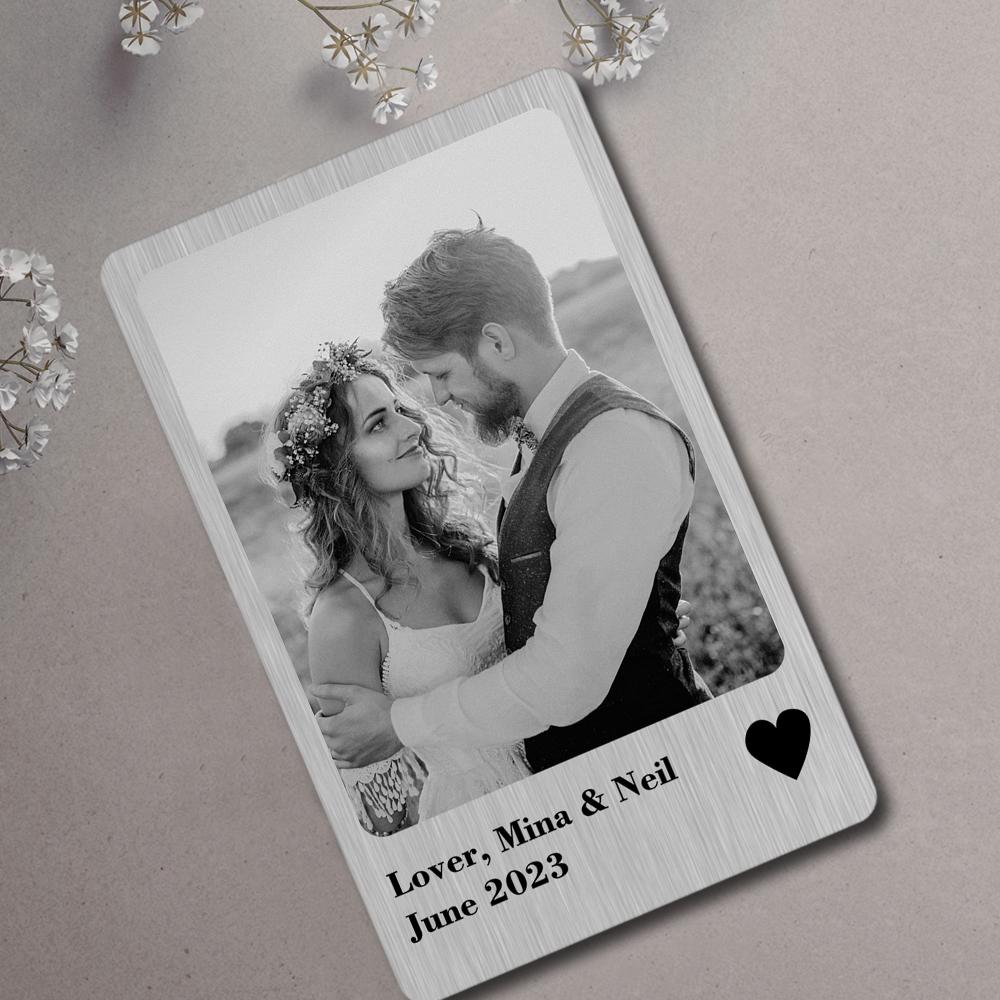 Reverse view of personalised metal wallet card displaying optional engraved name and clean laser-etched text