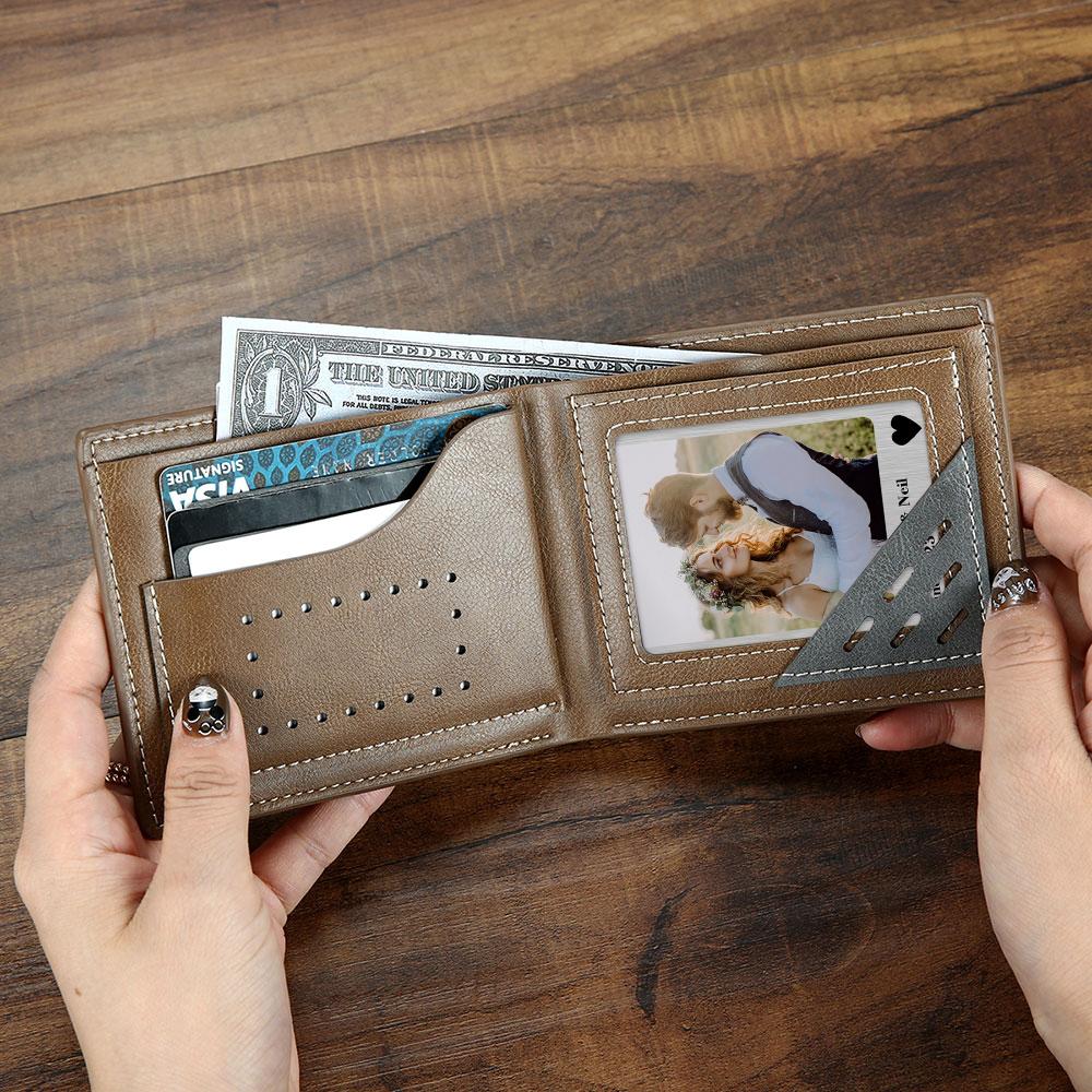 Polaroid-style personalised metal wallet photo card displayed flat to show photo area and smooth finish