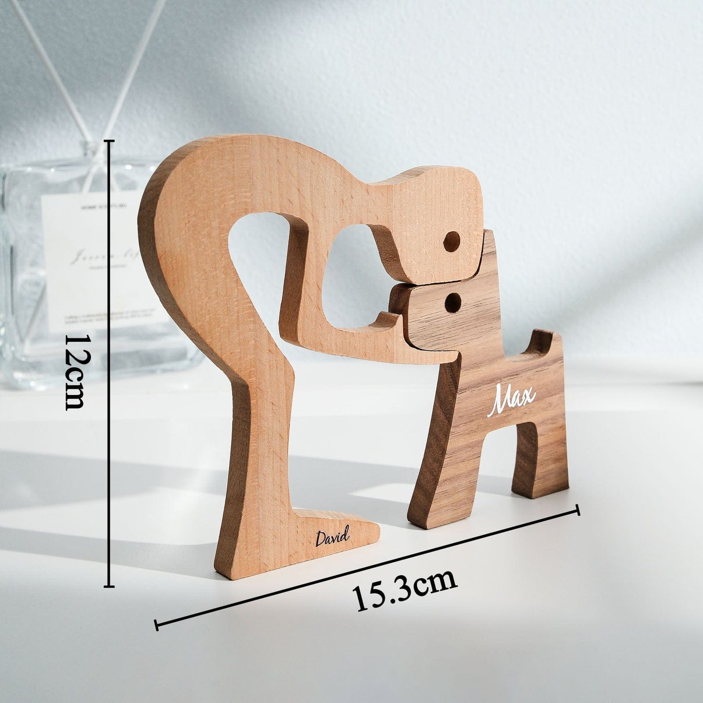 Personalised wooden pet carving block propped on a bedside table — comforting engraved pet memorial keepsake