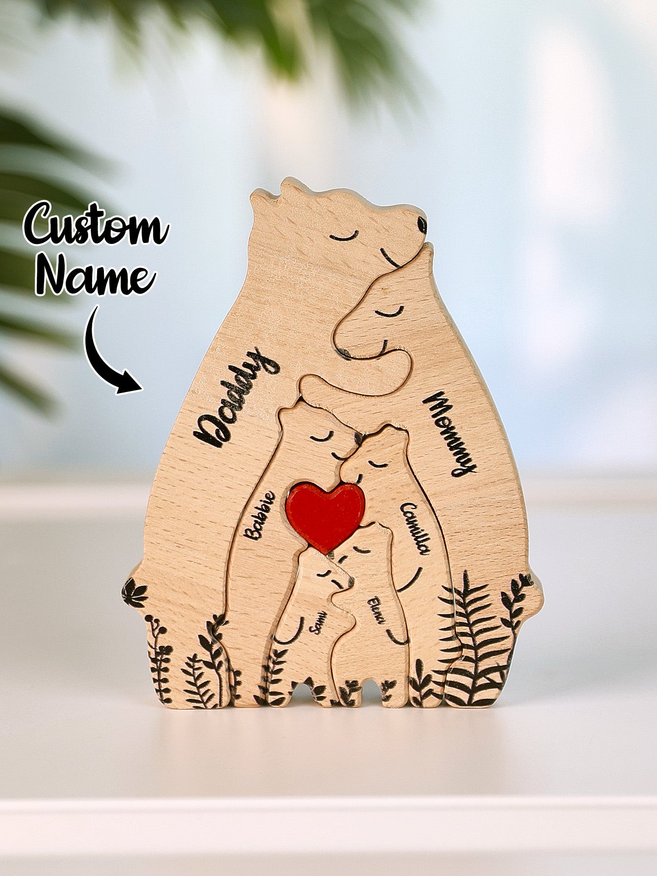 Natural wood grain and thickness detail of personalised wooden heart bear puzzle with visible engraved names and hearts