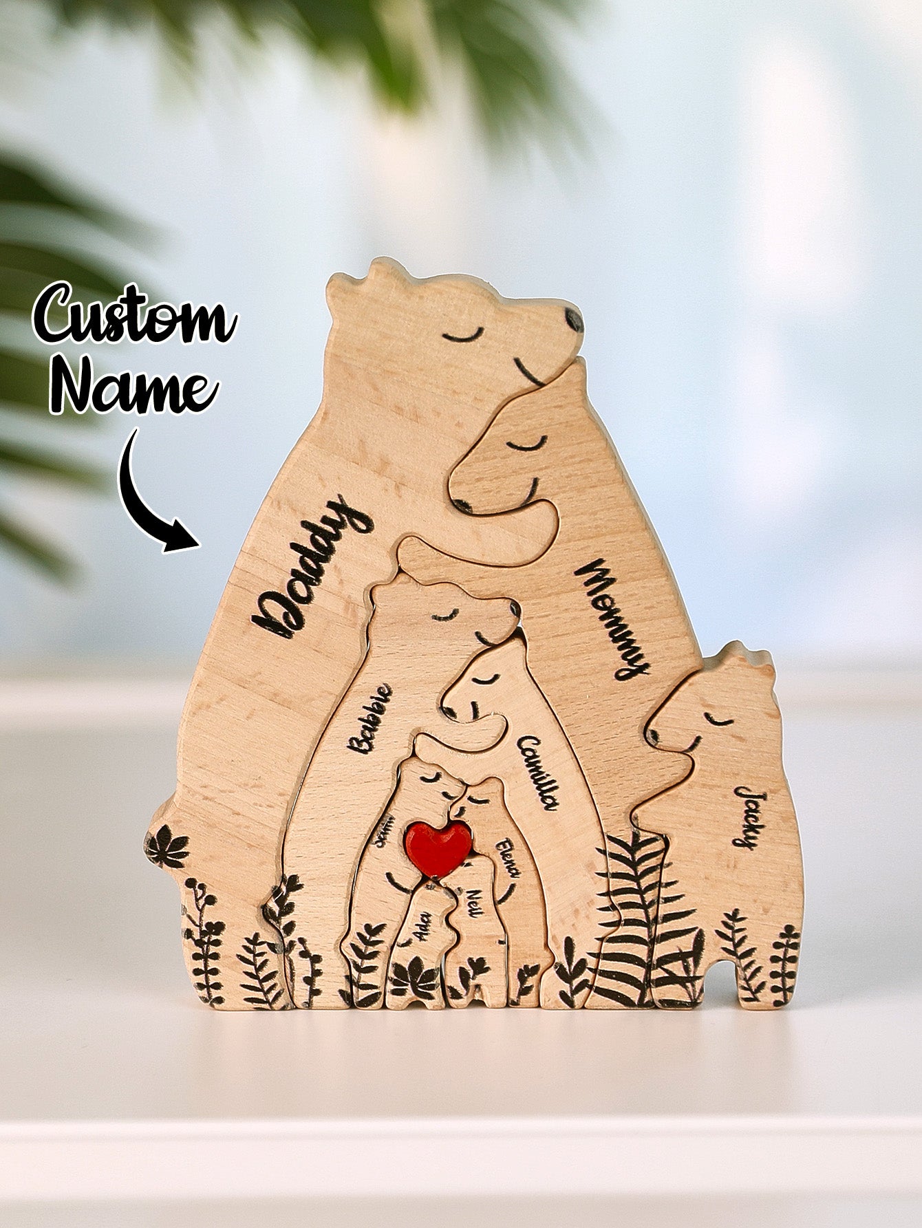 Variations of personalised wooden heart bear puzzles showing different numbers of bears and custom name options for family