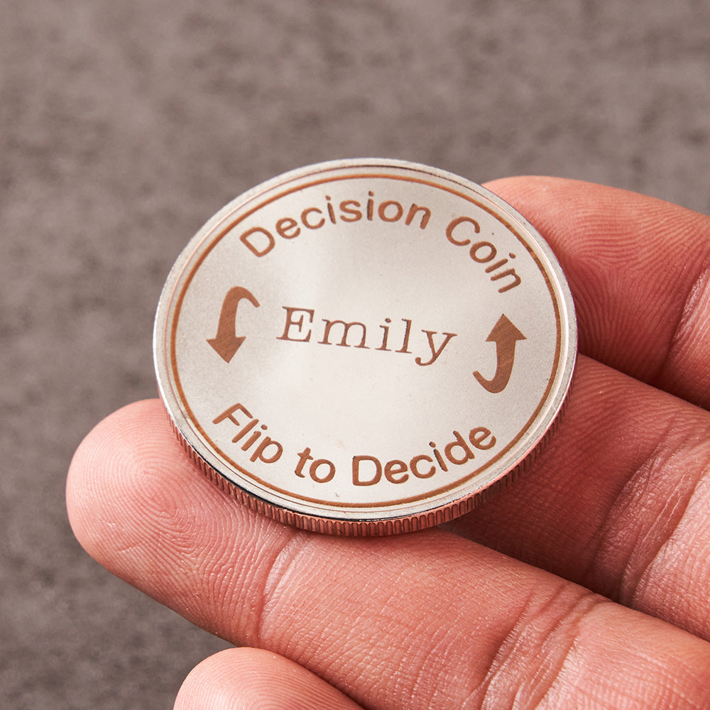 Photo-engraved custom flip coin displayed on a wooden surface, demonstrating the photo engraved coin option for a personalised keepsake