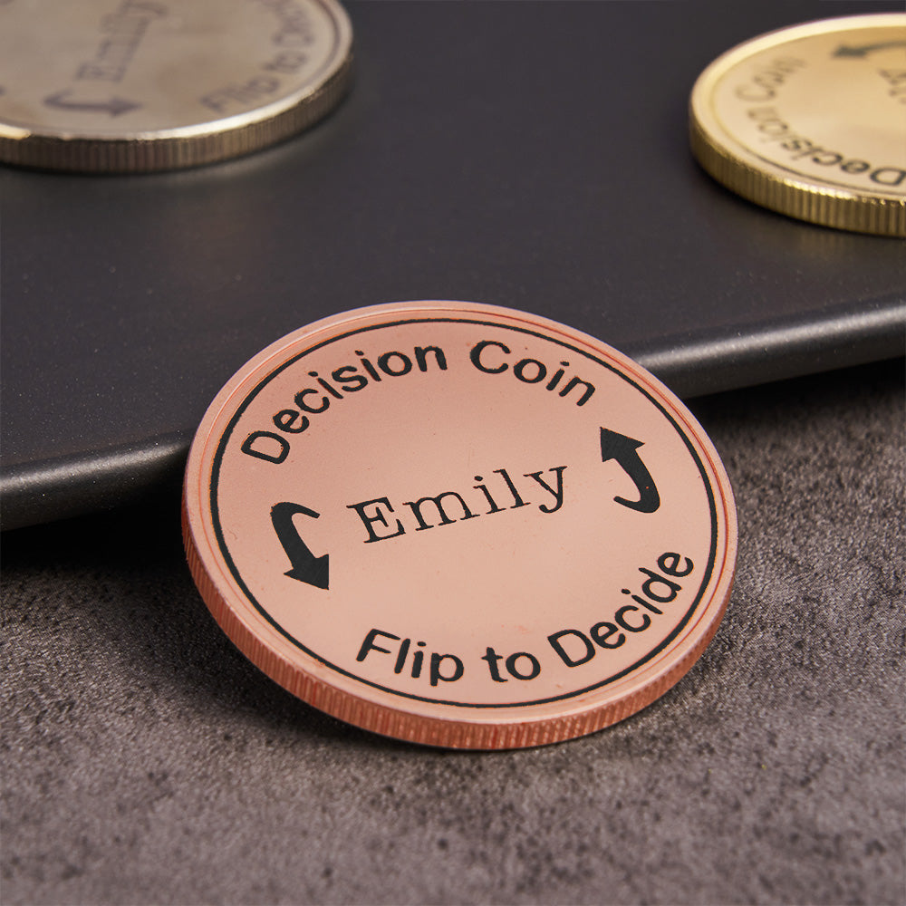 Pair of engraved decision coins showing front and reverse with clear custom text and decorative edge, premium personalised flip coin