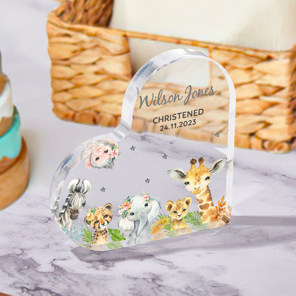 Detailed view of engraved acrylic heart ornament on stand — personalised christening or baptism keepsake