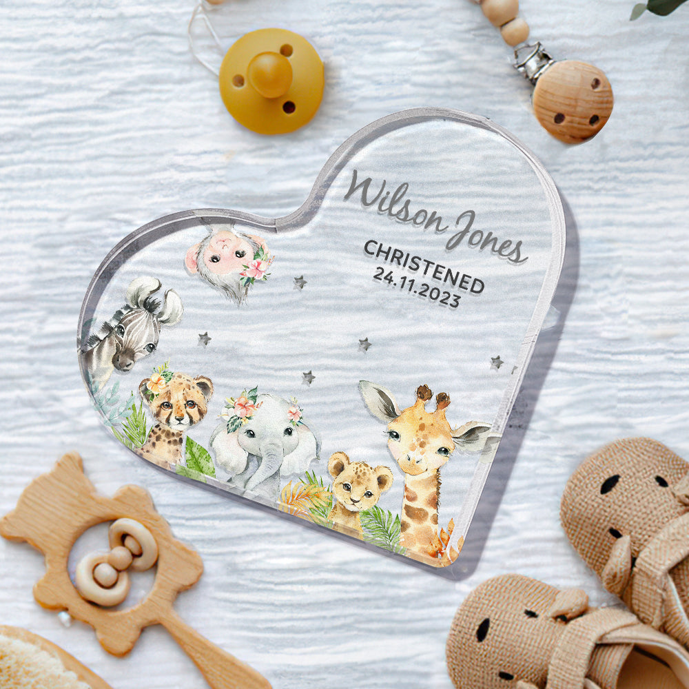 Close-up of engraved name and date on polished clear acrylic heart — ideal personalised baby gift for christening
