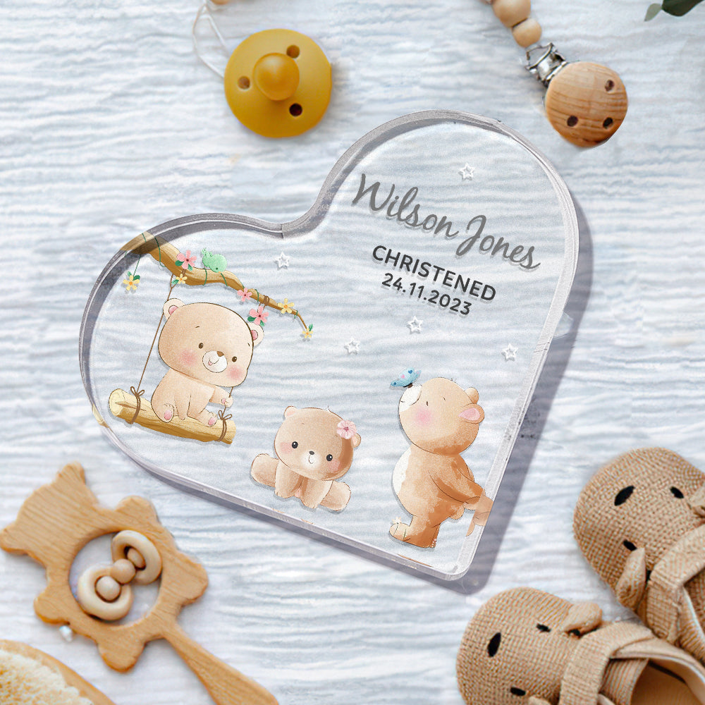 Detail of engraved lettering and animal illustration on polished acrylic heart — personalised baby keepsake gift