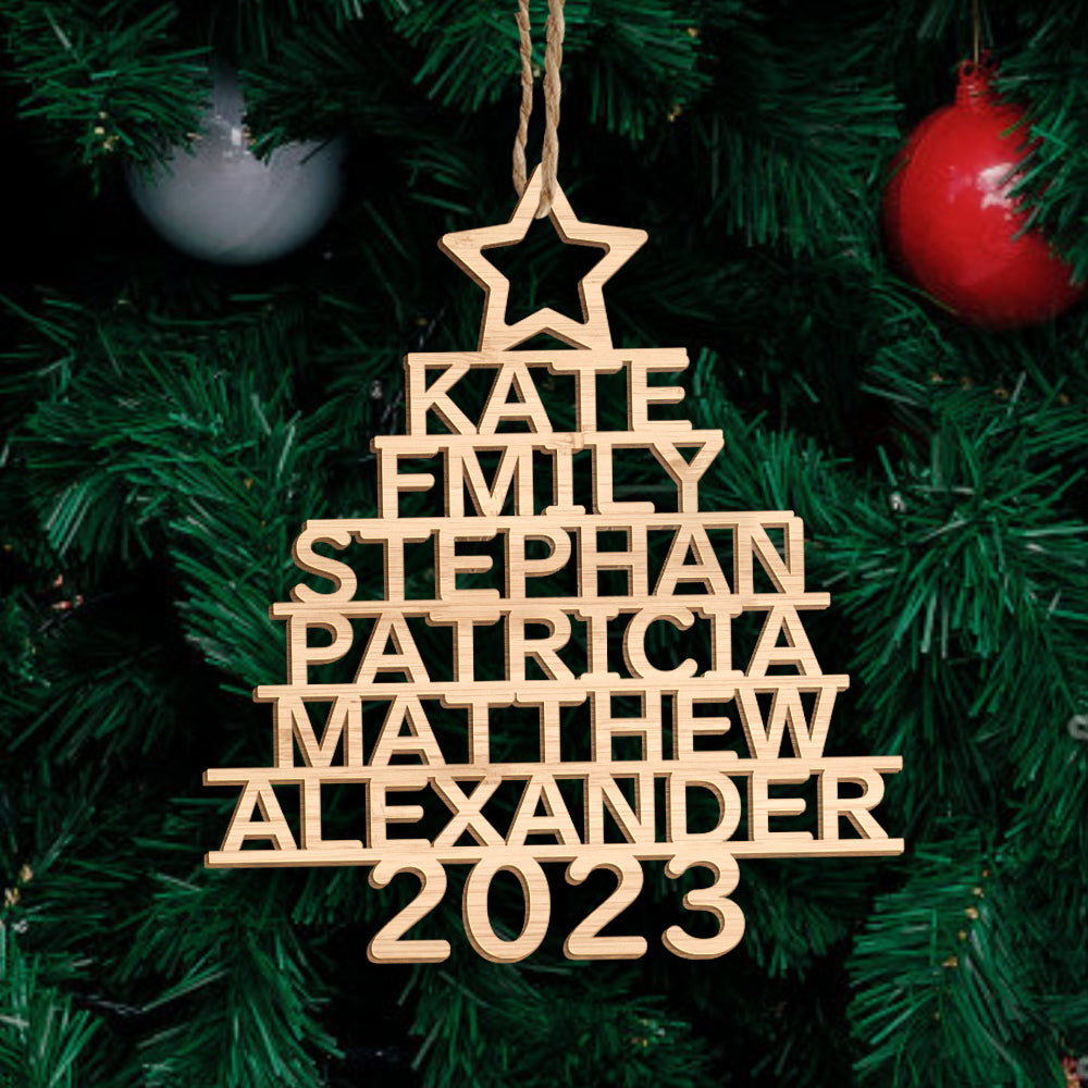 Personalised wooden decorations hung on a festive wreath, custom name ornaments used as seasonal home decor and thoughtful holiday gifts