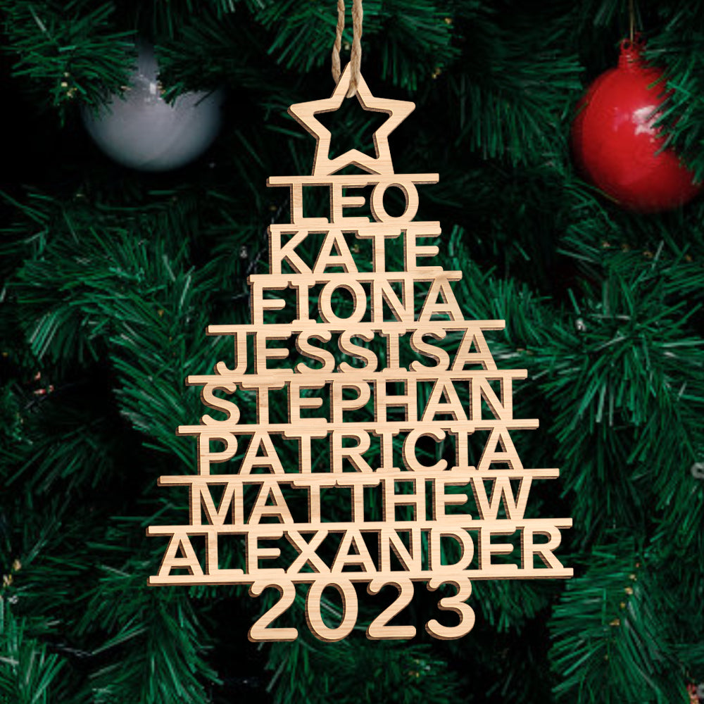 Gift-ready kraft box containing a personalised Christmas tree ornament, hand-finished custom name wooden decoration, perfect sustainable holiday gift