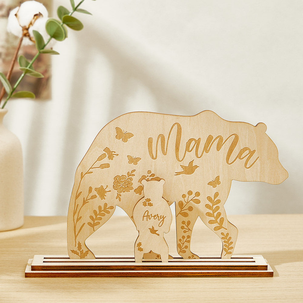 Close-up of engraved names on wooden mama bear and cubs keepsake highlighting fine detail and personalised engraving