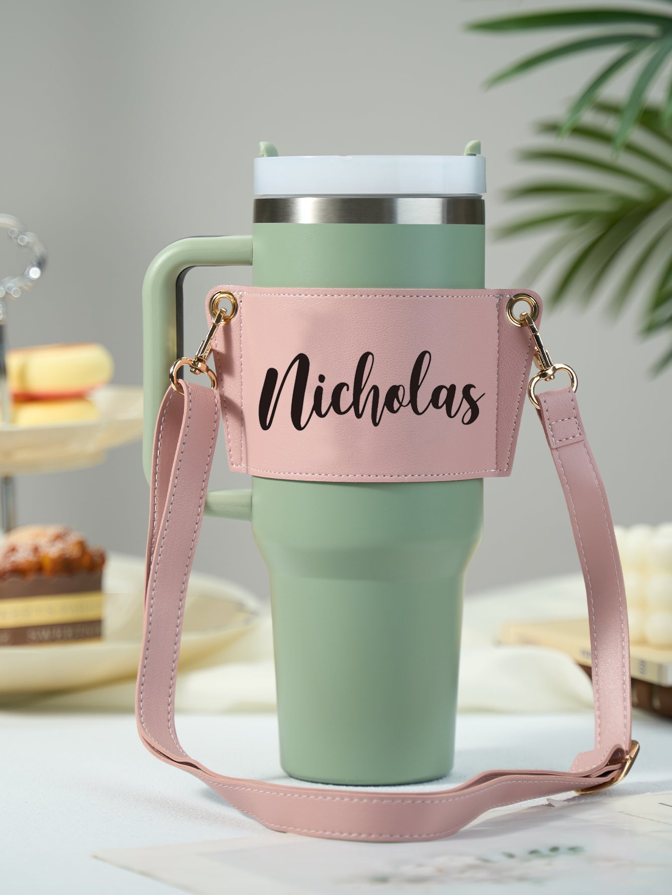 Side view of personalised PU leather 40oz Stanley tumbler carrier showing neat stitching and adjustable strap — stylish personalised water bottle carrier