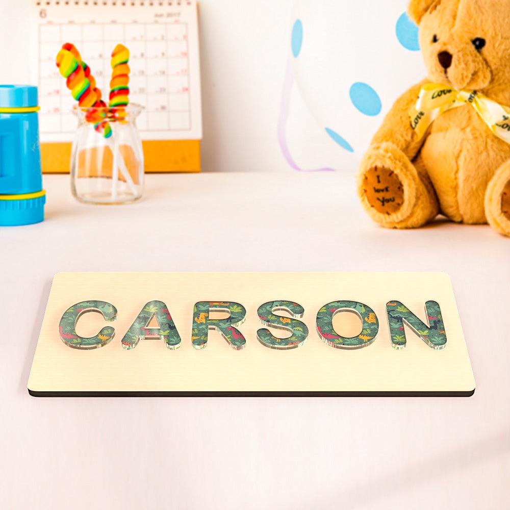 Close-up of an acrylic letter edge and smooth non-toxic finish on a personalised name puzzle for toddlers