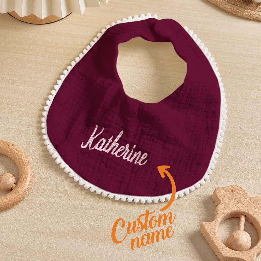 Gift-ready presentation of a personalised baby bib with embroidered name — thoughtful personalised newborn gift