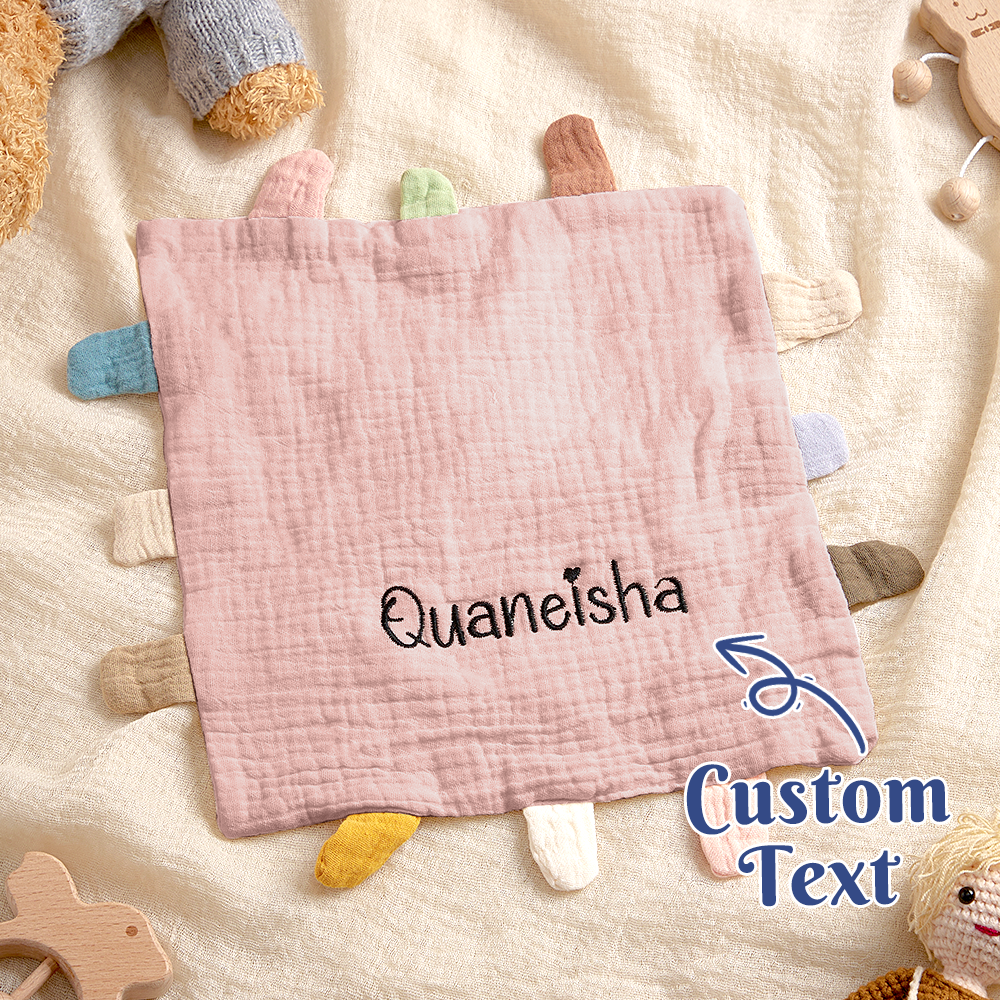 Personalised embroidered baby lovey styled in a nursery setting – soft cotton comfort towel for bedtime routines