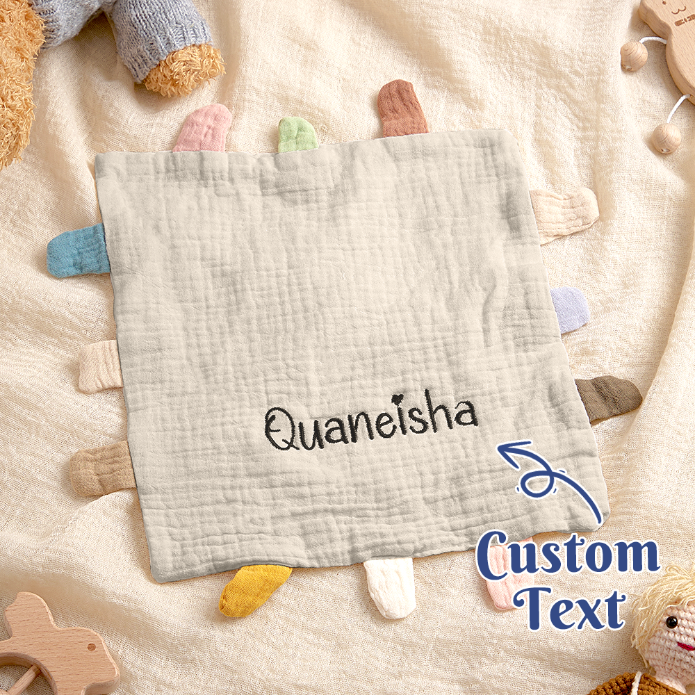 Size comparison of personalised baby comfort towel – 23 x 23 cm soft cotton lovey shown in an adult hand