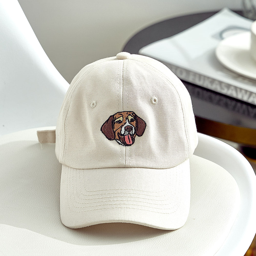 Close up of embroidered pet portrait on cotton cap highlighting stitch detail and shading on this personalised pet photo cap