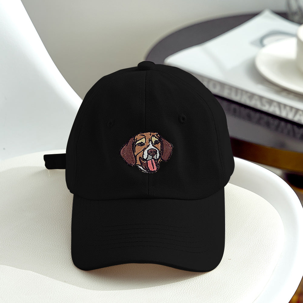 Flat lay of personalised pet photo baseball cap with embroidered pet portrait beside the original pet photograph, custom pet hat
