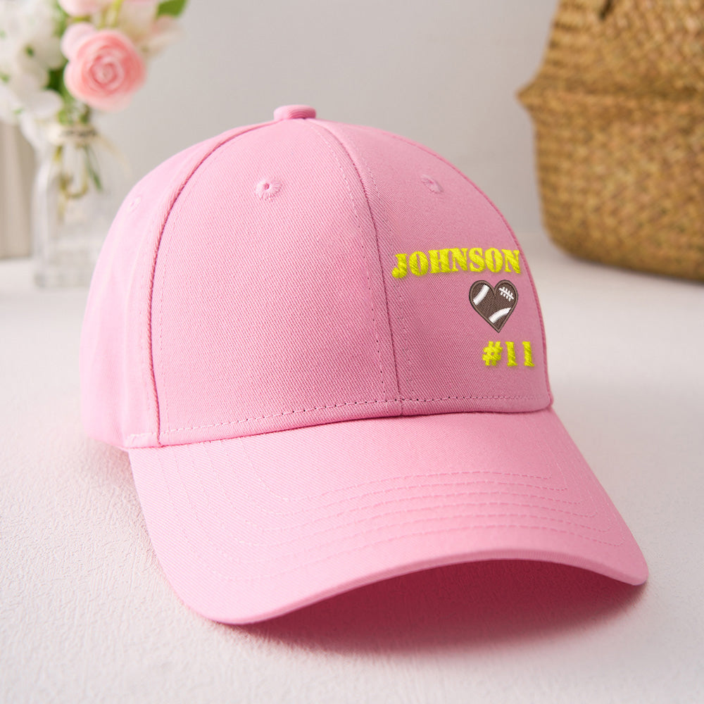 Front view of personalised football team cap with embroidered name on the crown — custom baseball hat for sports fans and players
