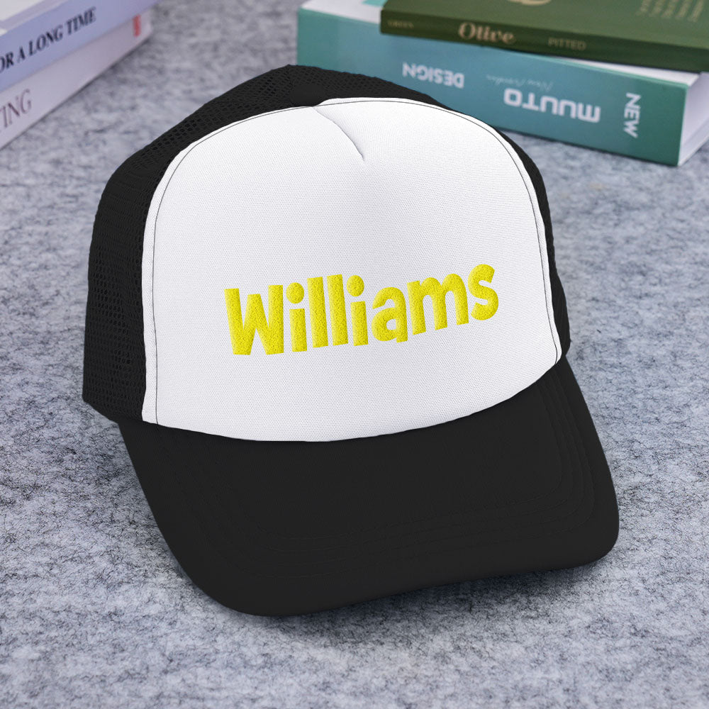 Model wearing Custom Name Foam Trucker Cap outdoors to illustrate styling and everyday use as a personalised gift