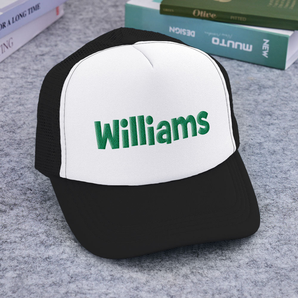 Angled product shot highlighting crown curve and printed front of Personalised Puff Print Trucker Hat for ecommerce listings