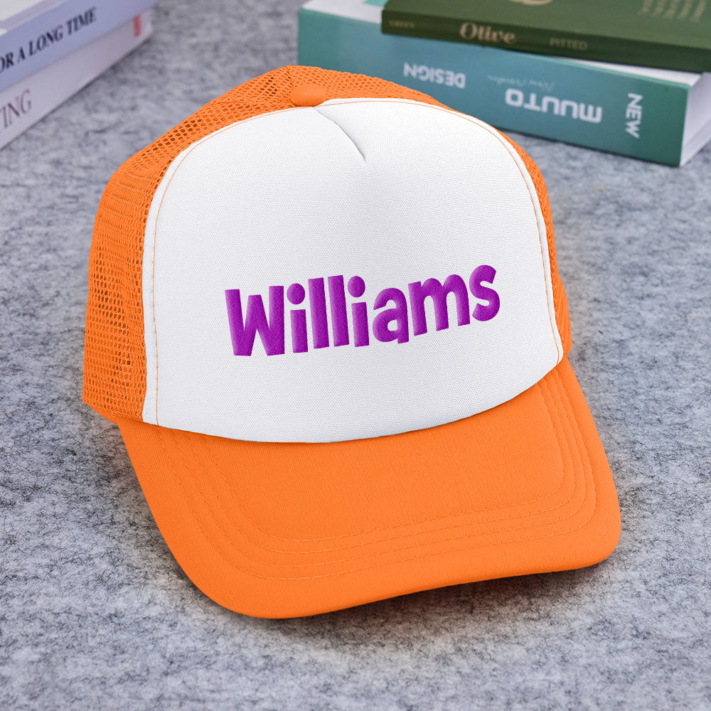 Close-up of breathable polyester mesh back on personalised puff-print trucker hat — comfortable for all-day wear
