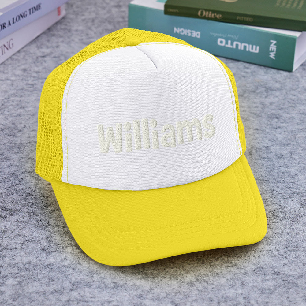 Close-up of foam front edge and puff-print on Personalised Puff Print Trucker Hat emphasising raised custom lettering