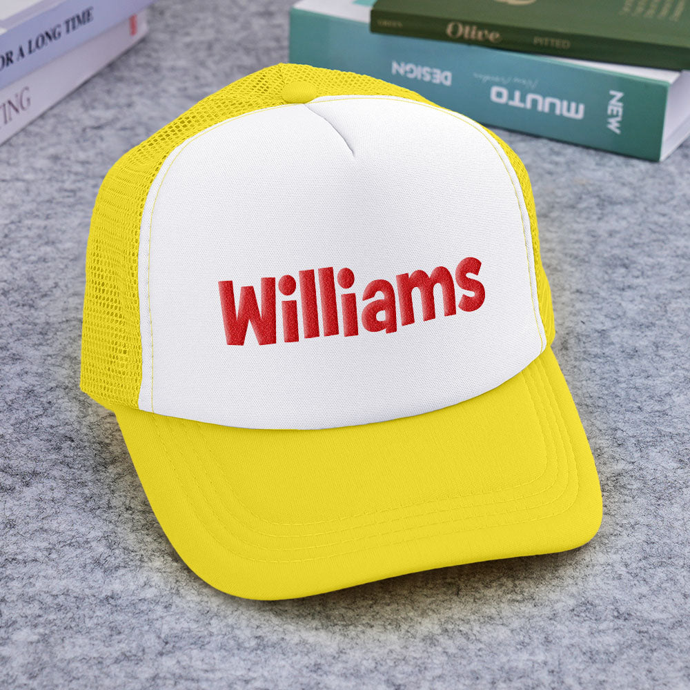 Close-up of snapback clasp and mesh panel on personalised puff-print trucker hat for breathable comfort