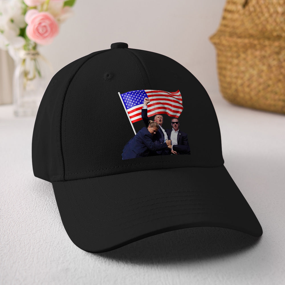 Angled side view of Trump 2024 supporter rally hat showing curved brim and high-quality embroidered campaign detail on cotton