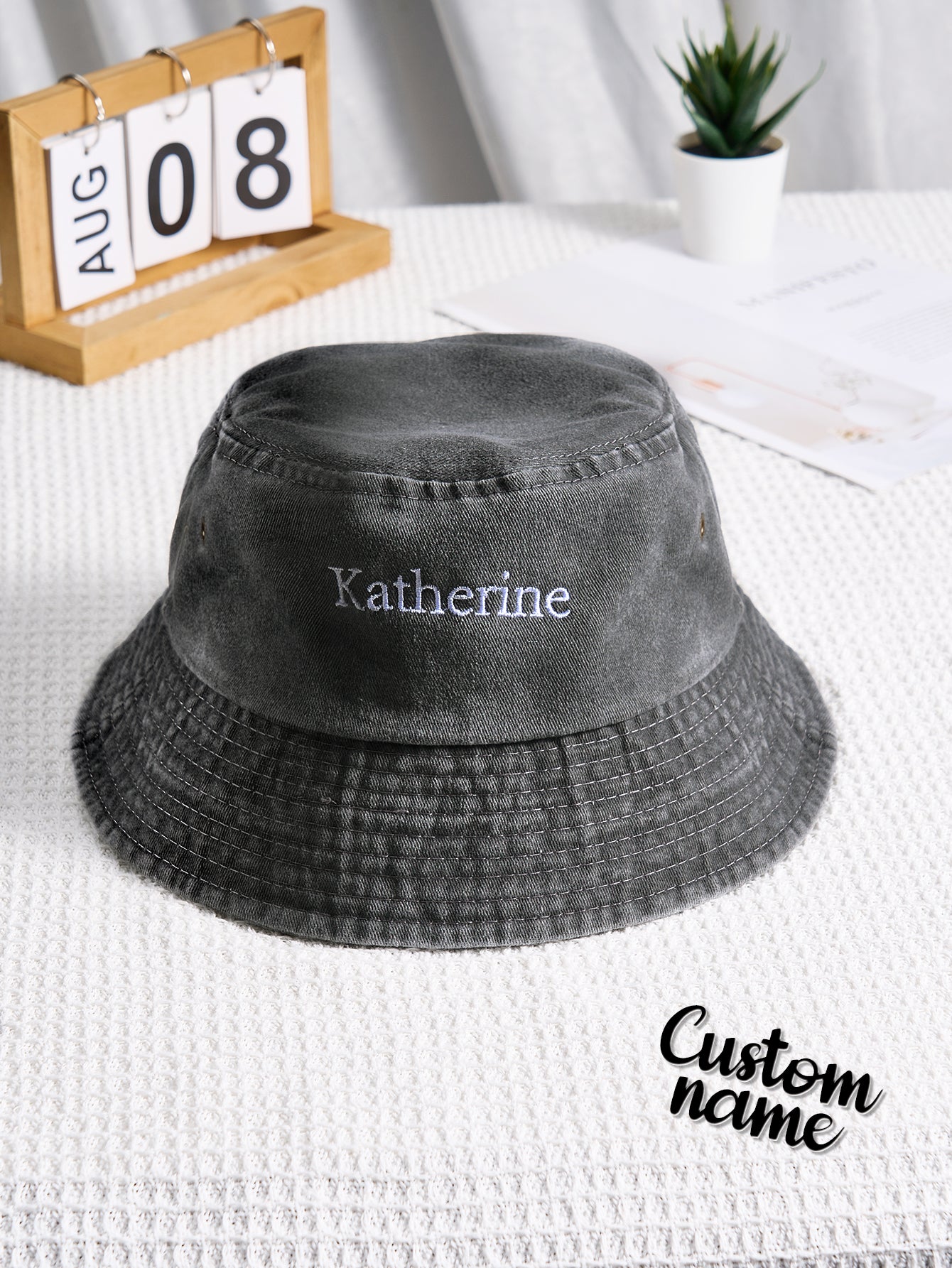 Model wearing personalised denim bucket hat styled casually — personalised cap perfect as a thoughtful gift for women and teens
