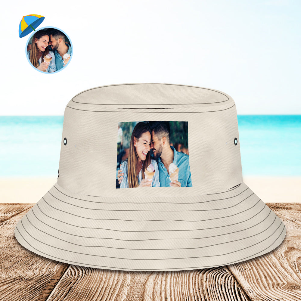 Folded personalised photo bucket hat packed ready for travel — lightweight, packable custom sun hat ideal for holidays