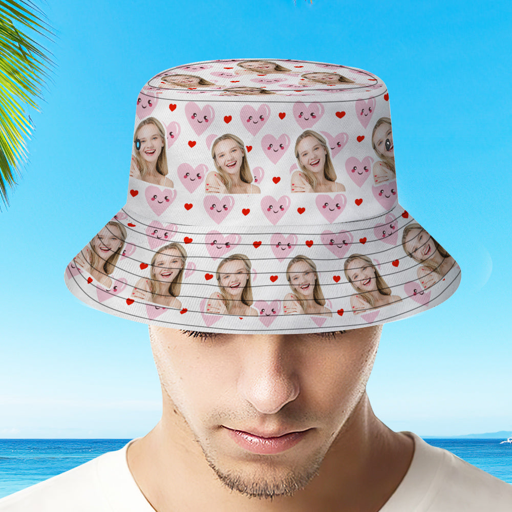 Side view of personalised pink heart bucket hat with custom face photo, foldable lightweight polyester fisherman hat ideal for travel and sun protection