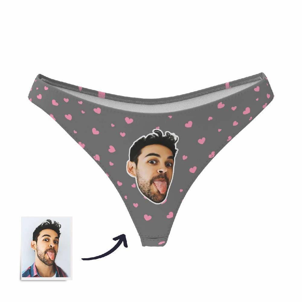 Close-up front shot of personalised face thong showing heat-transfer printed photo and little heart on soft polyester low-waist panties