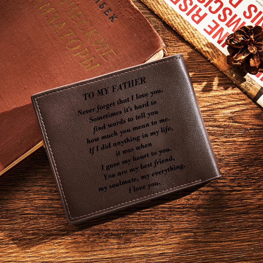 Close-up of personalised text engraving on leather wallet showing name and quote customisation example — ideal personalised present