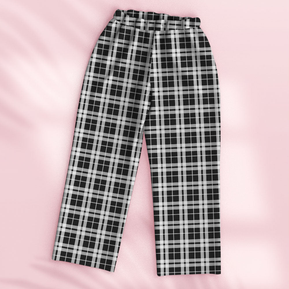 Close-up of personalised engraved lattice pyjama top showing precise face cutout and engraved text on stretchy fabric — customised loungewear