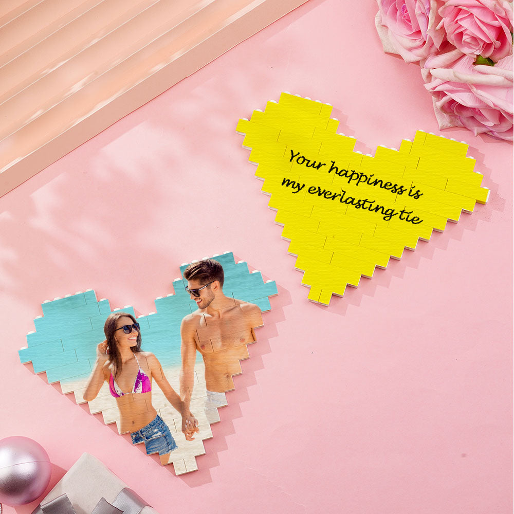 Assembled heart-shaped photo block displayed as a decorative ornament on a shelf — personalised keepsake for home or office