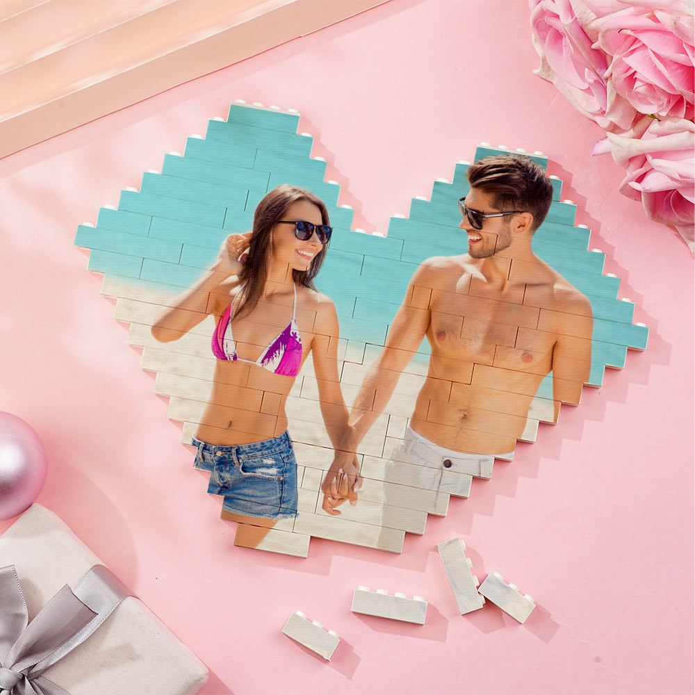 Size guide comparison showing small, medium and large heart-shaped photo block puzzles with measurements for personalised displays