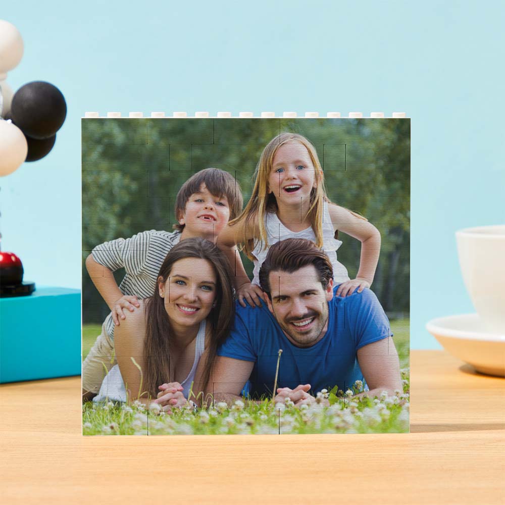 Square photo block puzzle pieces assembled to display a personalised photo keepsake