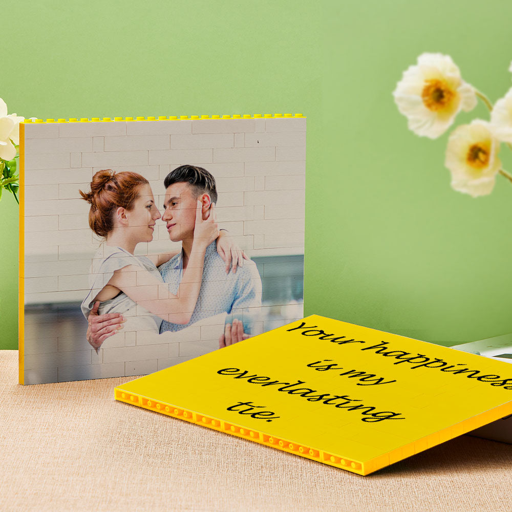 Close-up of UV digital print on personalised yellow building block photo puzzle showing vivid, high‑definition colour and seamless photo reproduction across bricks