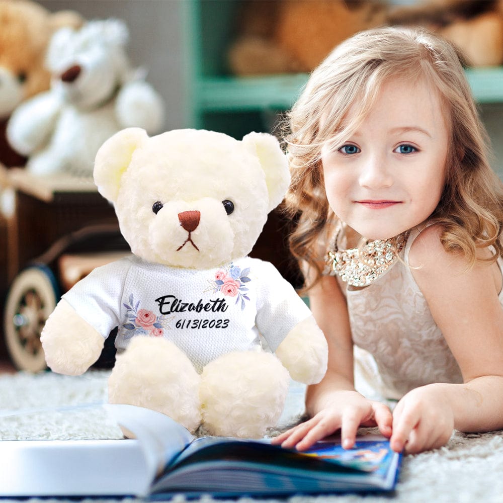 Close-up of personalised teddy bear face with bright eyes and embroidered nose, removable clothing option