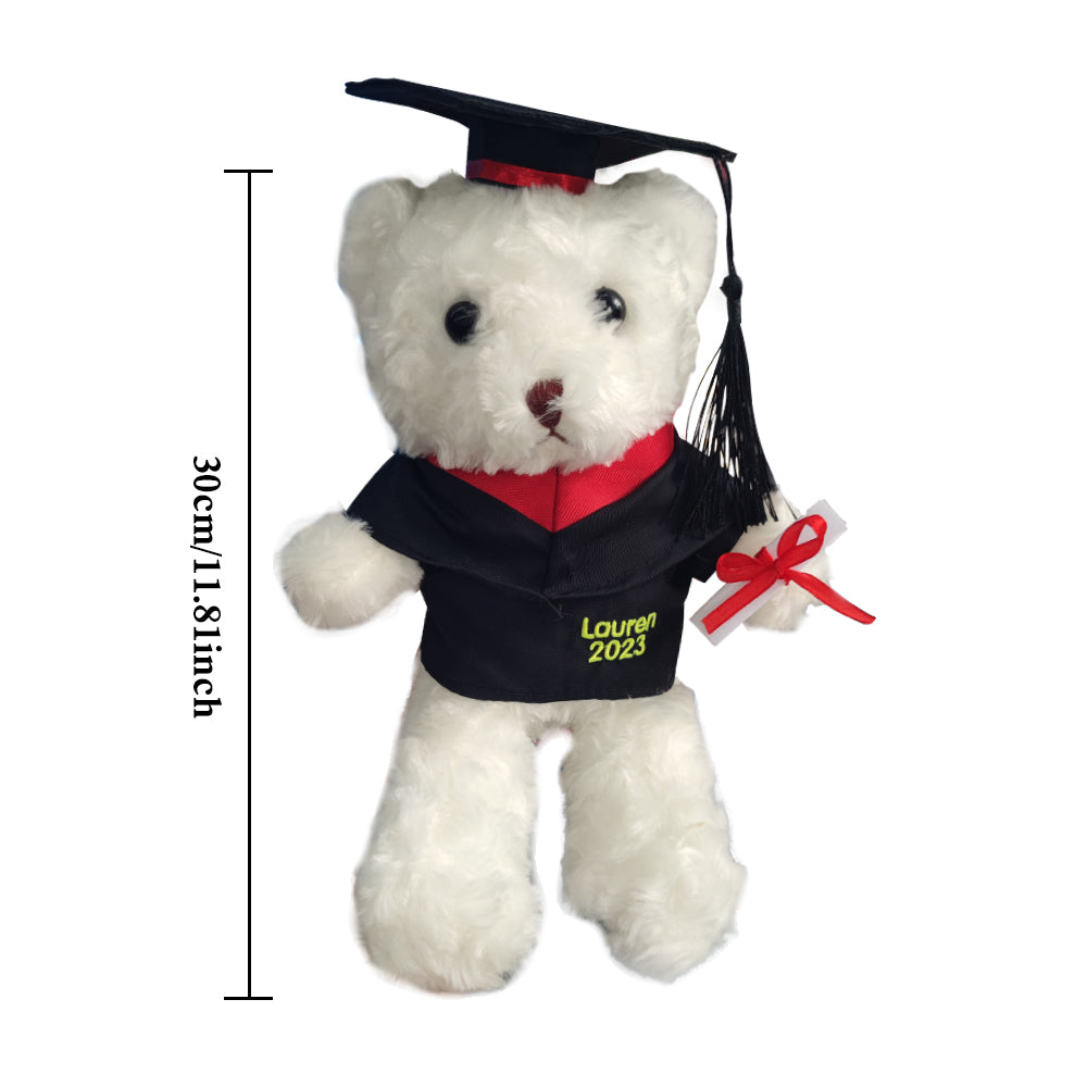Close-up of personalised graduation bear robe showing professional embroidered name and graduation year on soft cotton fabric