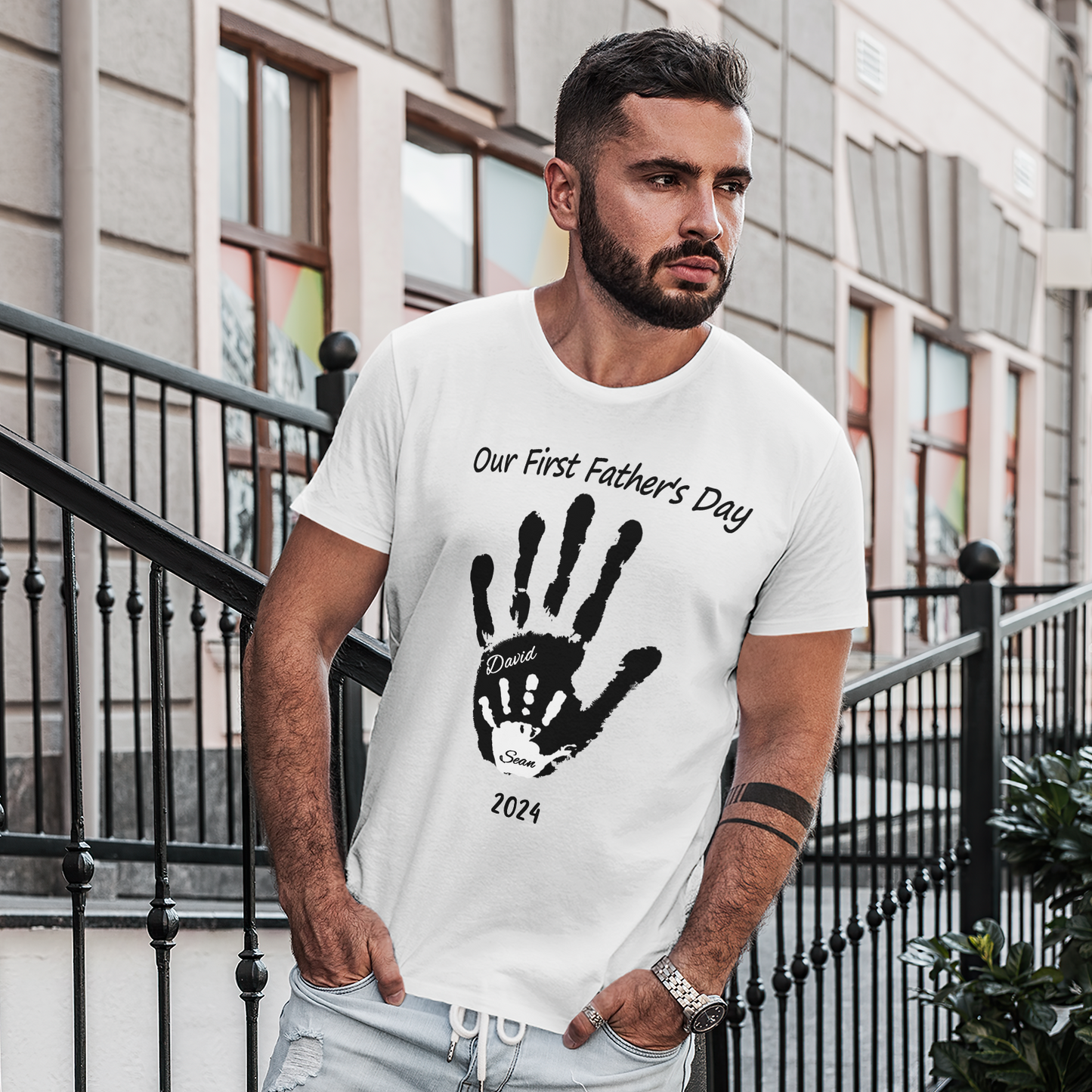 Close-up of personalised baby handprint print on soft cotton T-shirt — detailed view of personalised Father’s Day shirt print