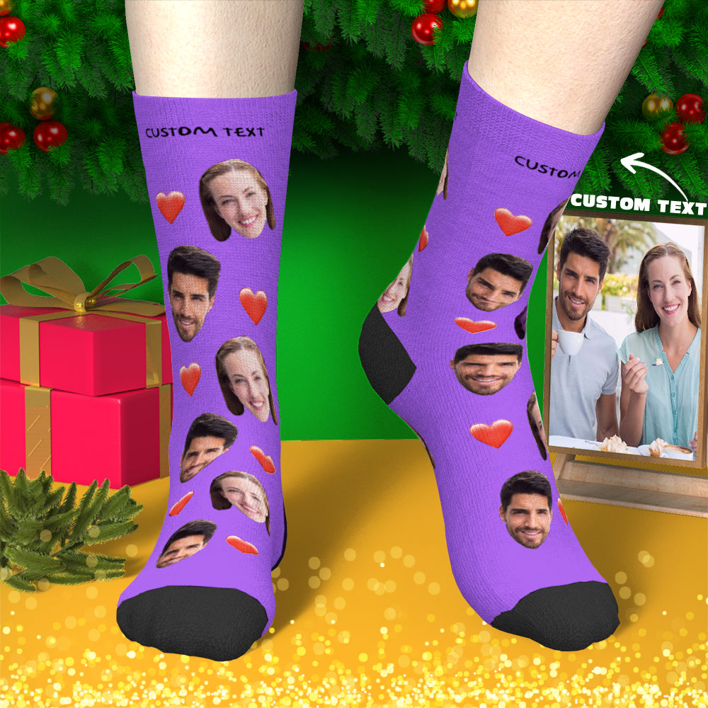 Close-up of personalised face socks showing heart-shaped photo print and heat-transfer colour detail