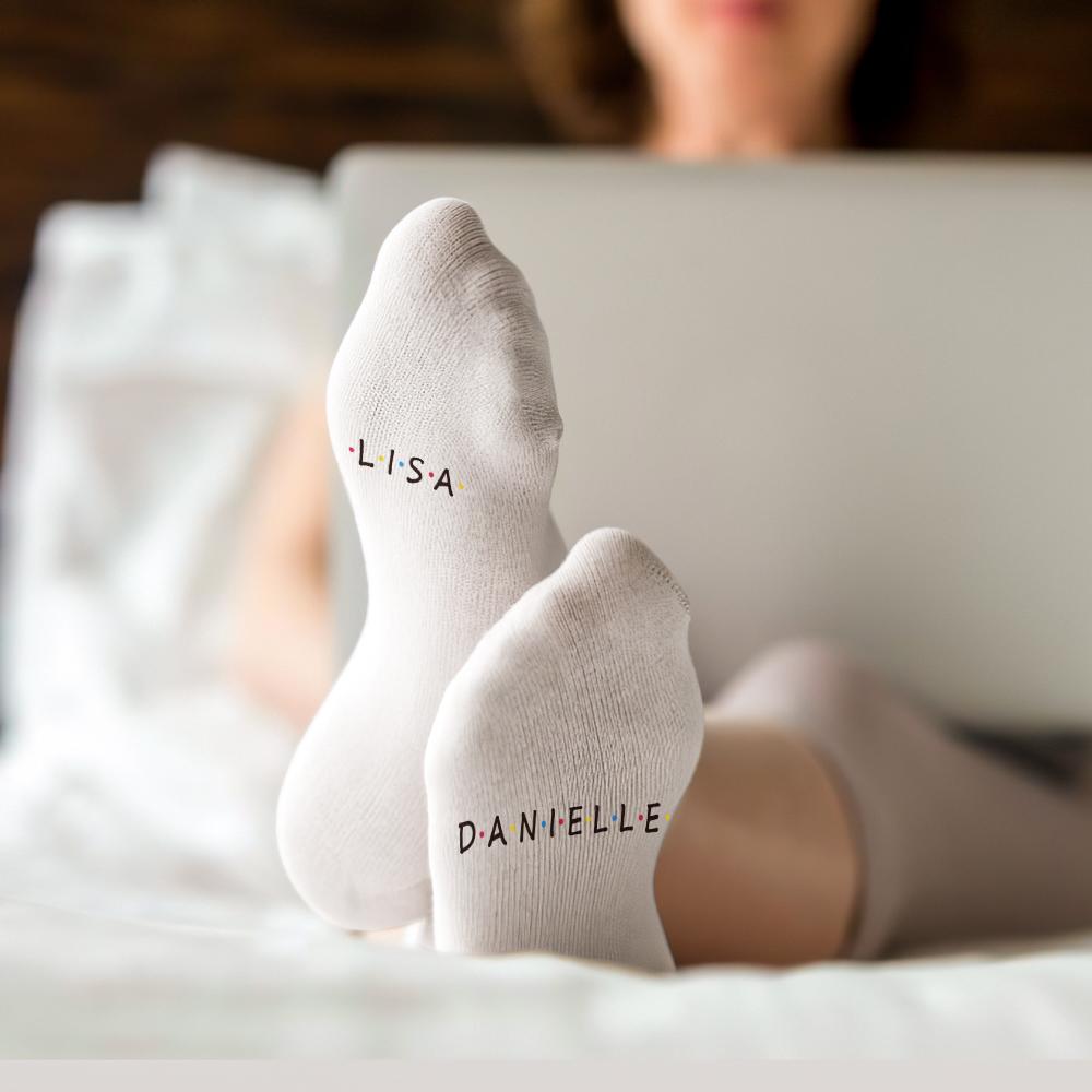 Detailed view of personalised engraved Santa sock highlighting print quality, stitching and customised sole text – great personalised gift for Christmas and seasonal promotions